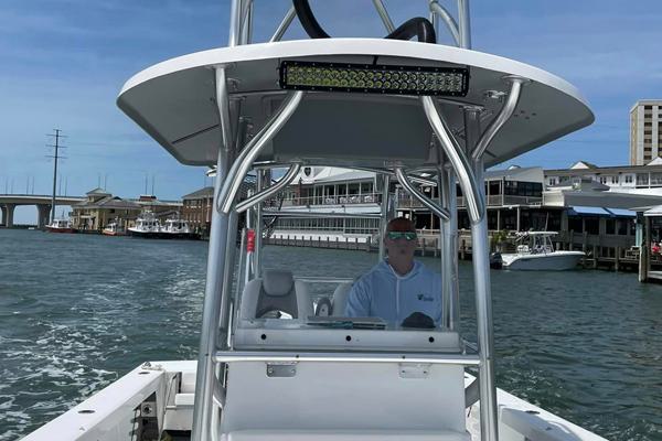 Front View of Captain Tom Driving the Boat
