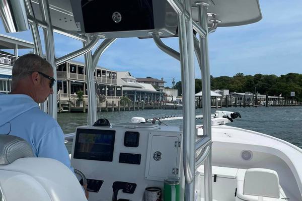 Captain Tom Driving the Boat